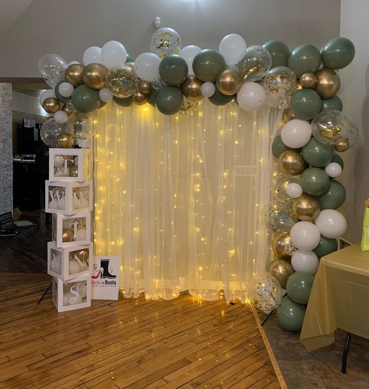 a room decorated with balloons and lights