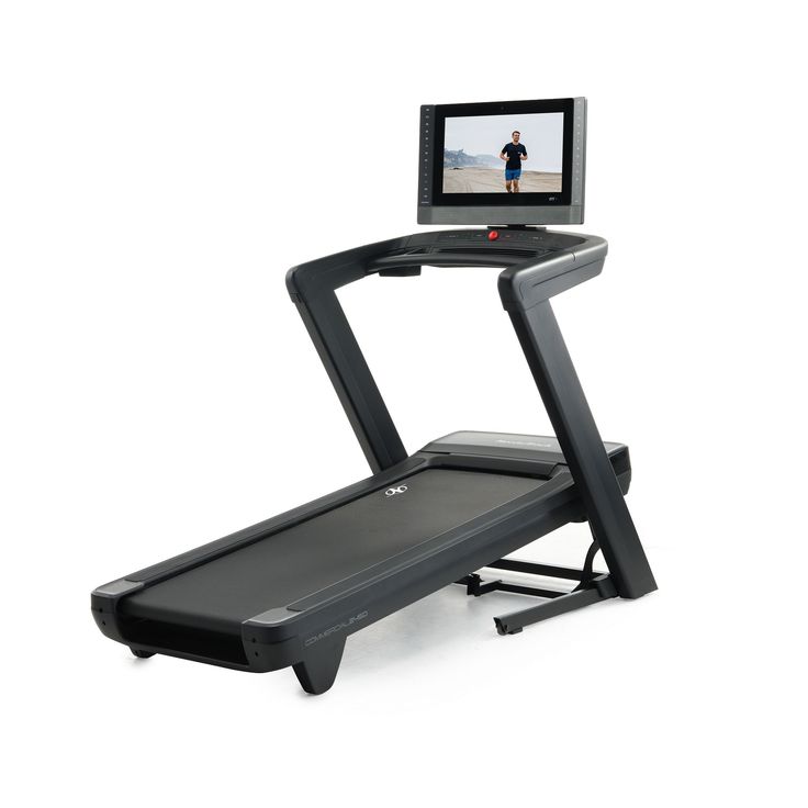 a treadmill with a tv on top of it