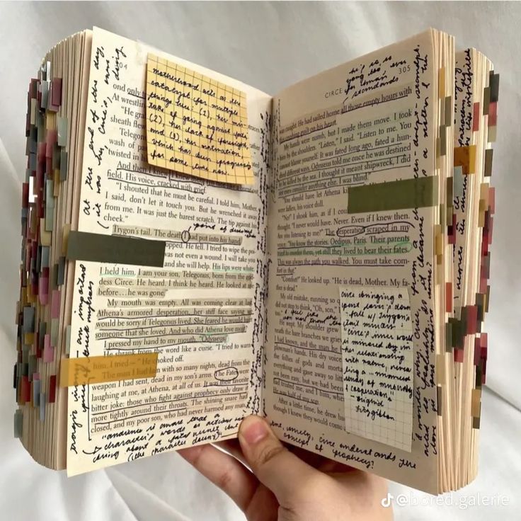 an open book with many different types of writing on it