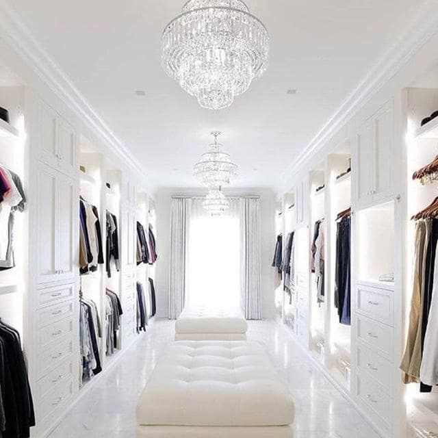 a white room with lots of closet space