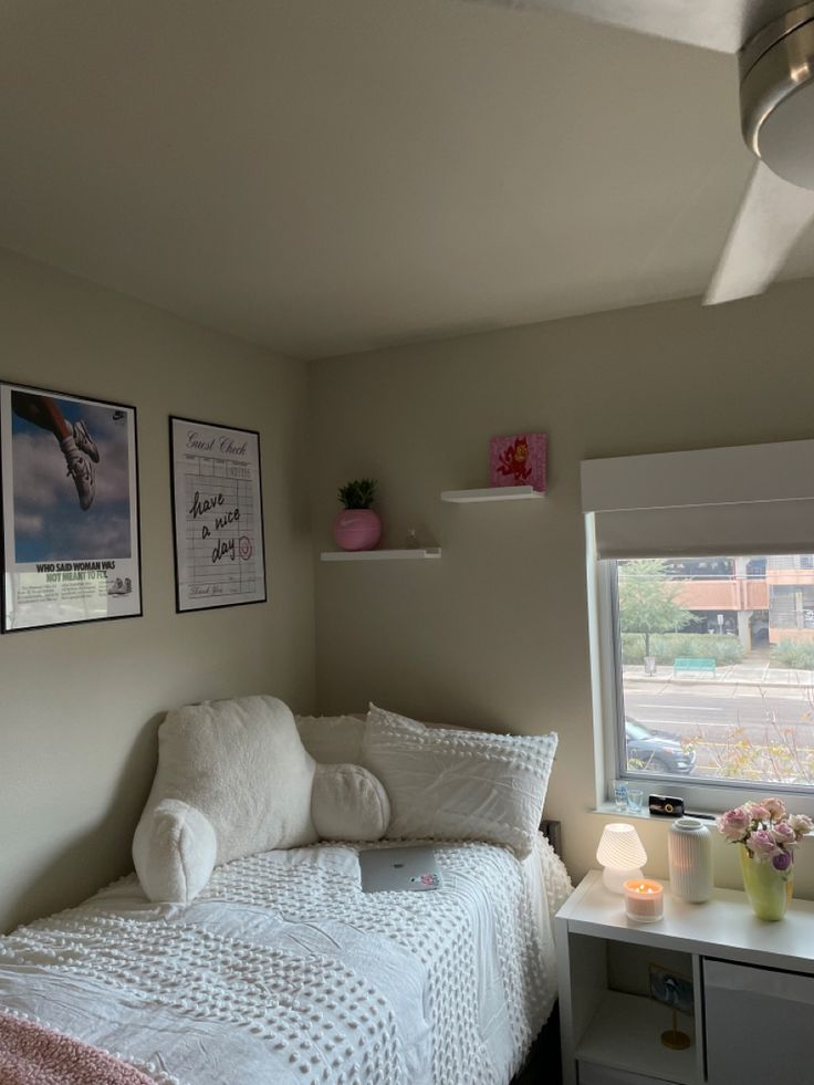 ASU, Dorm Room, Dorm, Aesthetic, White Aesthetics, Posters, White Comforter, Nightstand, Candle, Pink, Flowers, Instagram Feed, Feed Trendy Dorm Room Ideas Minimalist, Asu Dorm, University Dorm Room Decor, Simple Dorm Room Ideas, Bed In Middle Of Room, Dorm Couch, Dorm Bed Skirts, Pretty Dorm Room, Dorm Room Layouts