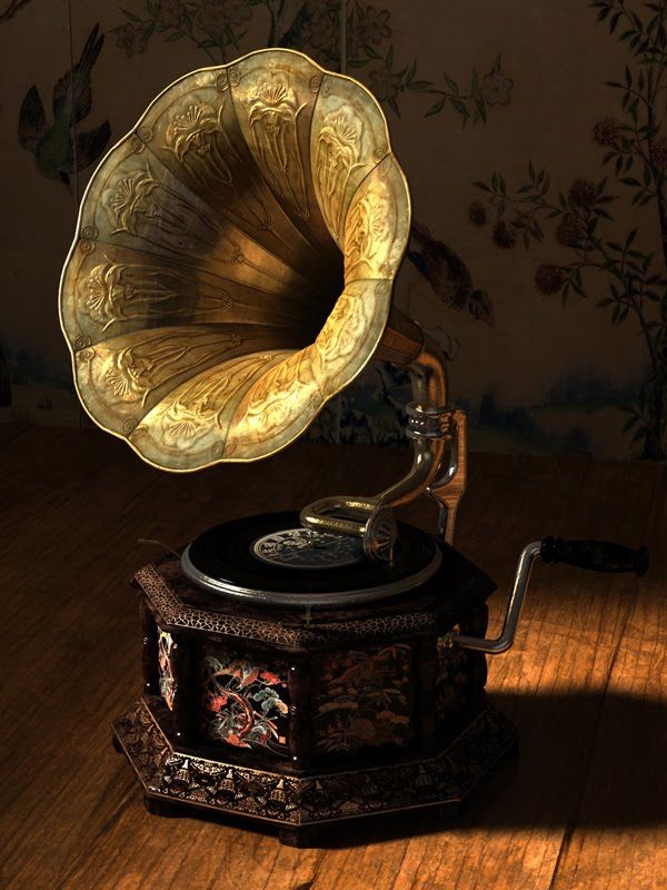 an old phonograph sitting on top of a wooden table