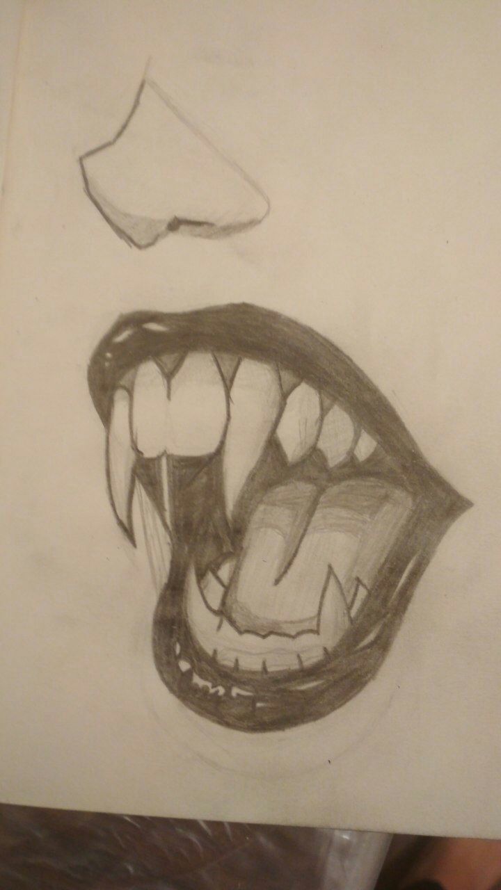 a pencil drawing of a mouth with teeth