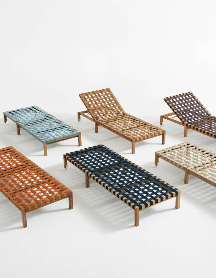 six wooden lounge chairs with different patterns on them