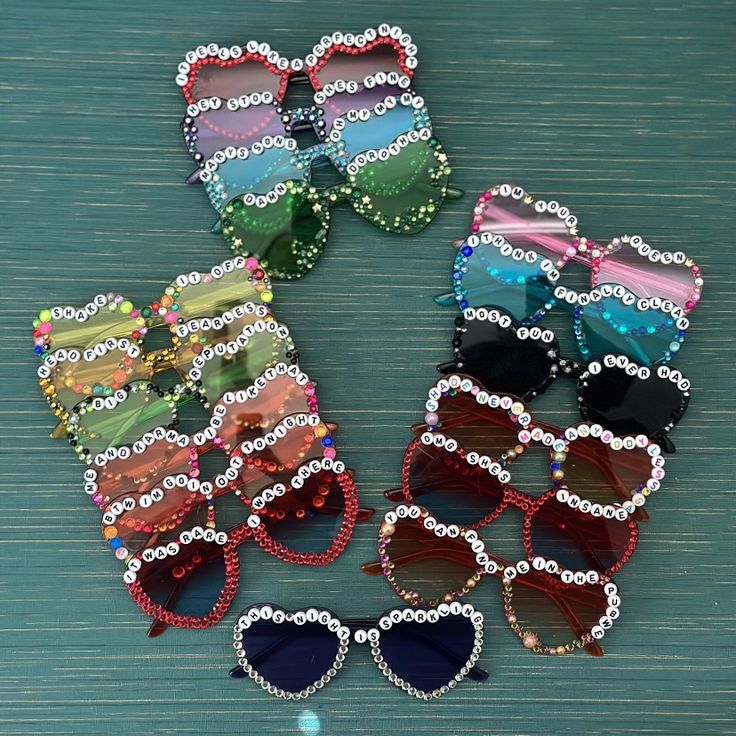 several pairs of sunglasses with hearts on them