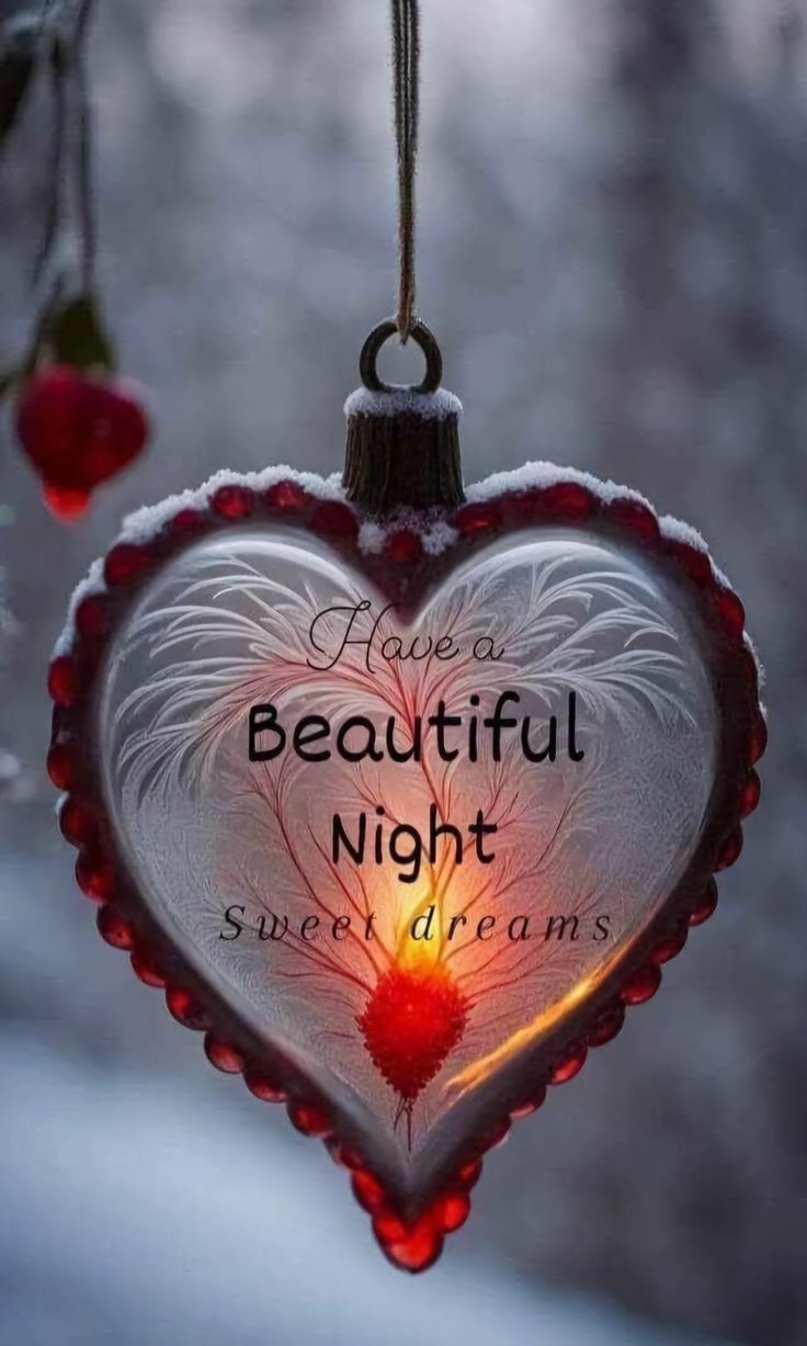 a heart shaped glass ornament with the words have a beautiful night sweet dreams