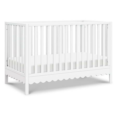 a white crib that is on display