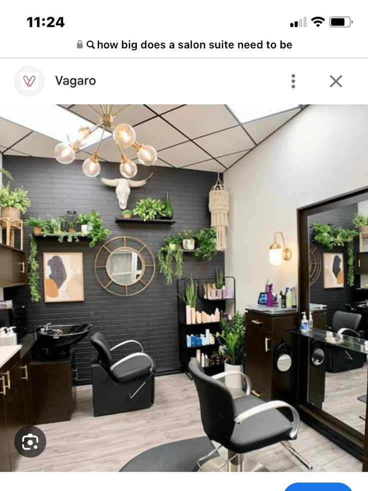 a hair salon with chairs, mirrors and plants on the wall above it is an instagram post