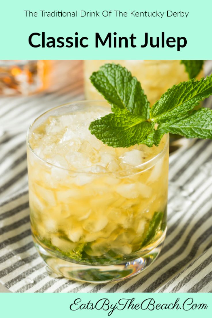 two glasses filled with minty lemonade and ice on top of a striped table cloth