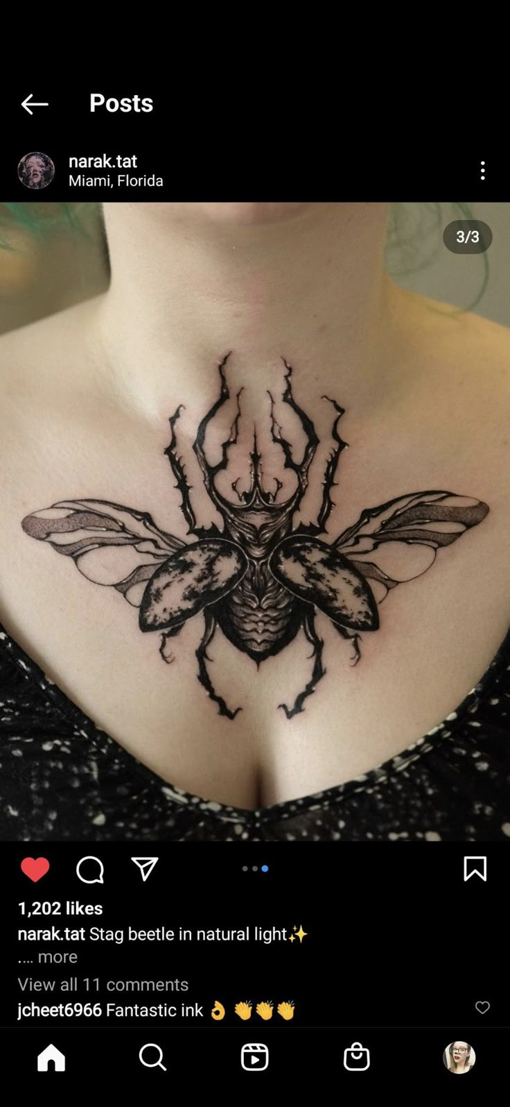 a woman's chest with a black and white tattoo design on the top of it