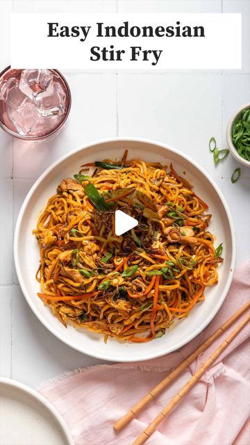 an image of a plate of food with chopsticks next to it and the words easy indonesian stir fry