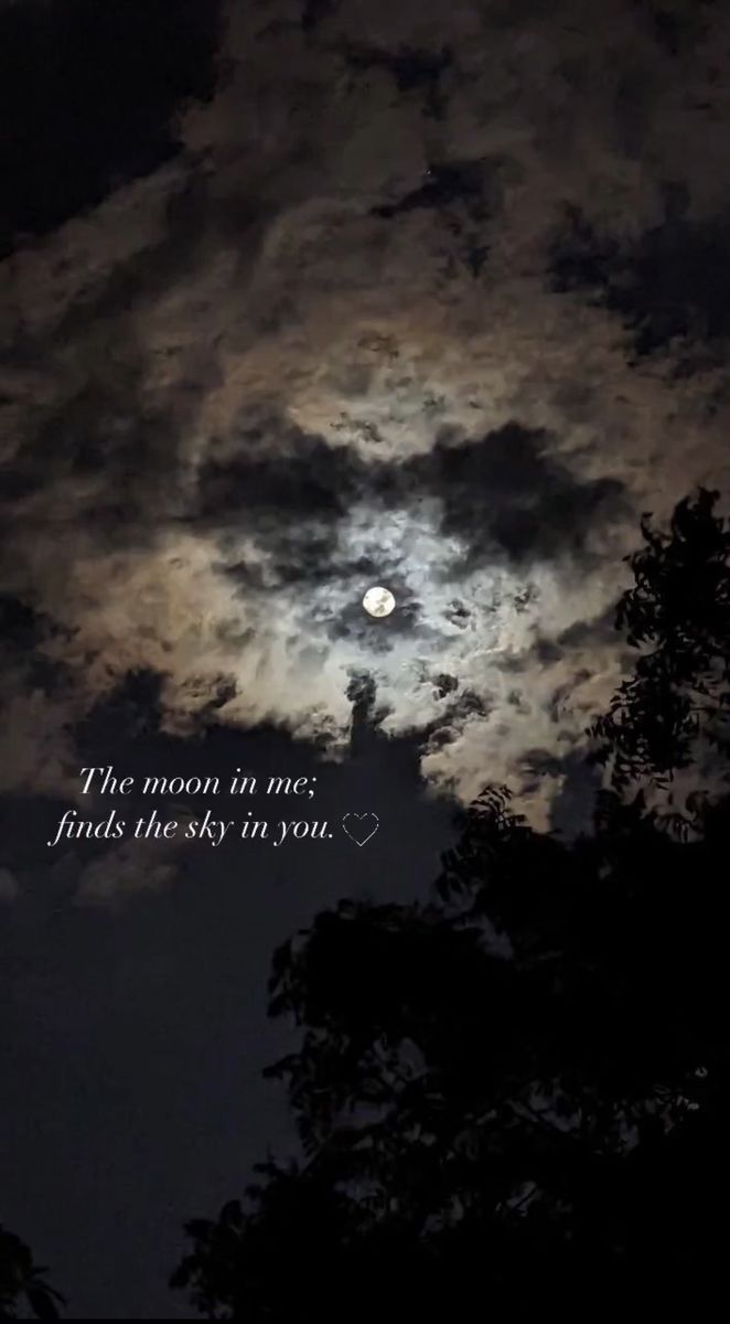 the moon is in the sky with trees below it and an inspirational quote above it