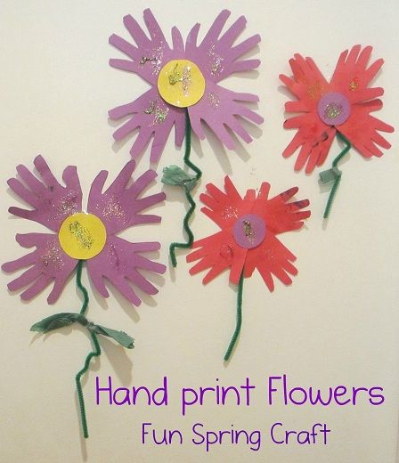 three flowers made out of construction paper with the words hand print flowers fun spring craft