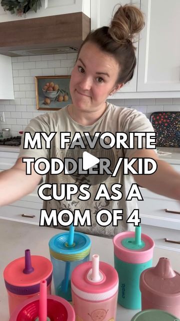 a woman standing in front of cups with the words my favorite toddler / kid cups as a mom of 4