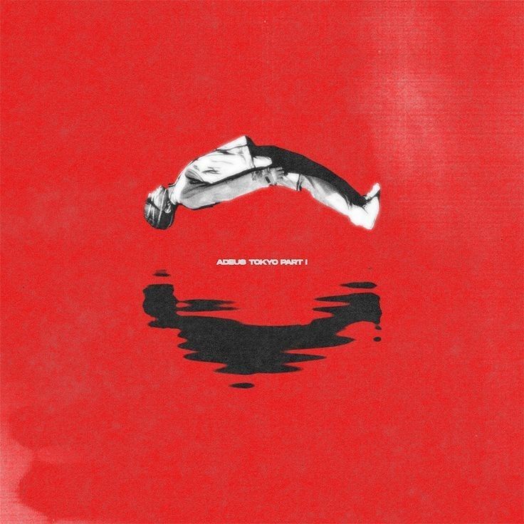 a person diving into the water with red background