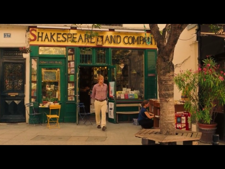 a man standing in the doorway of a store