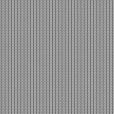 an image of a gray and white knitted fabric textured with diagonal stripes or zigzags