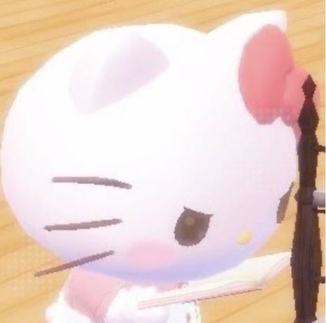 an animated image of a hello kitty holding a cane