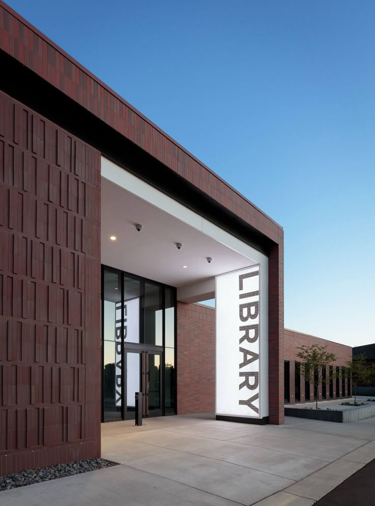 an entrance to a library with the words library on it