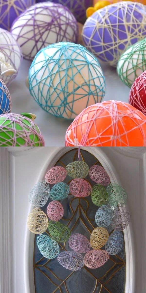 many colorful balls are on display in front of a white door with a circular window