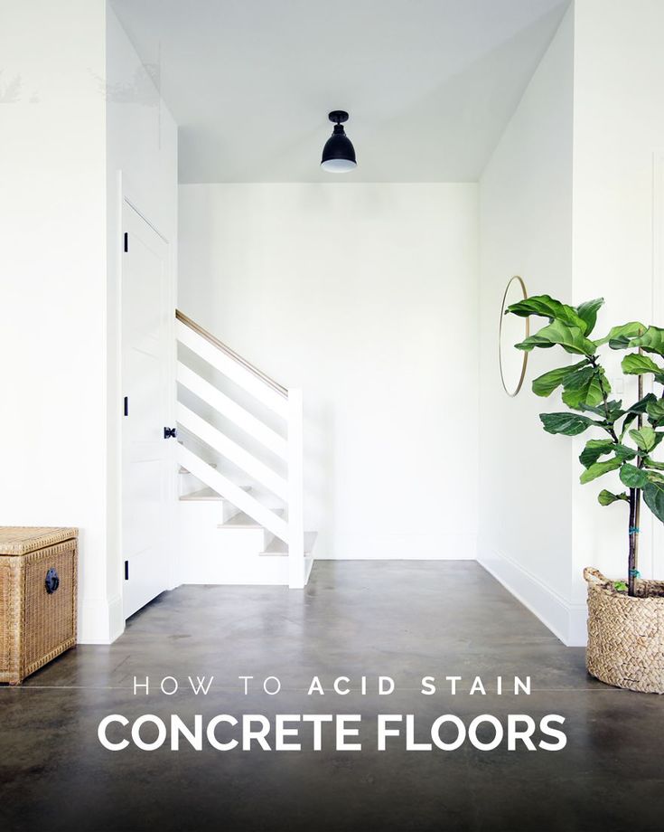 a plant in a basket next to a stair case with the words how to acid stain concrete floors