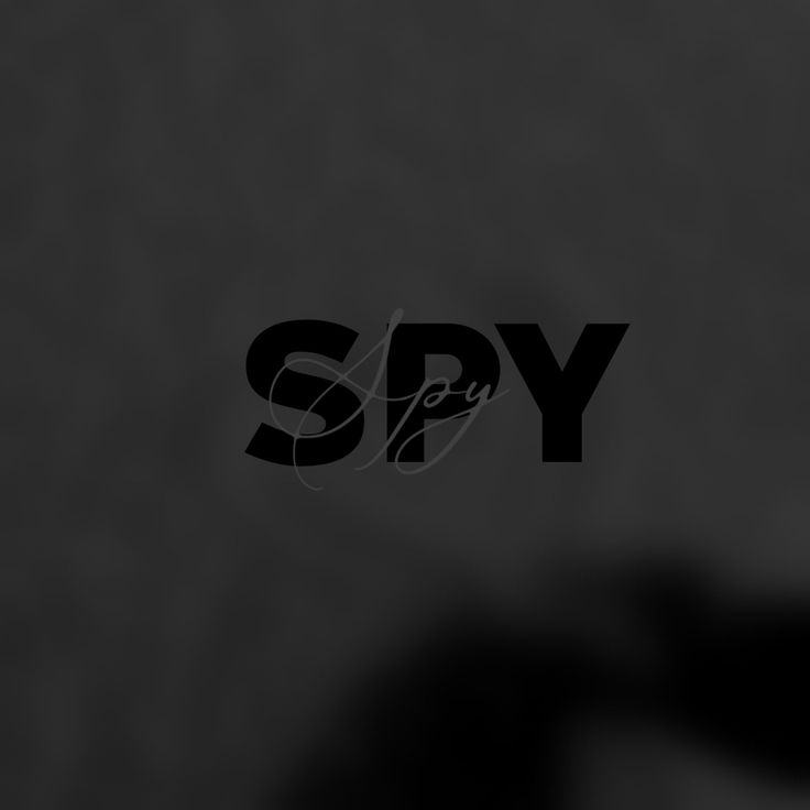 black and white photo with the word spy on it's left side, in front of a dark background