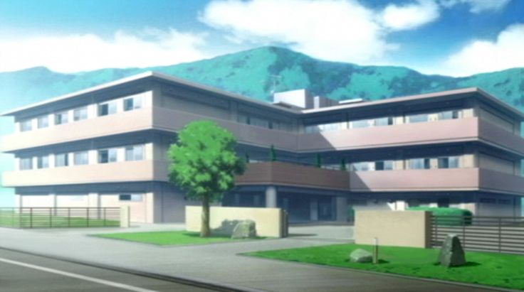 an anime building with mountains in the background