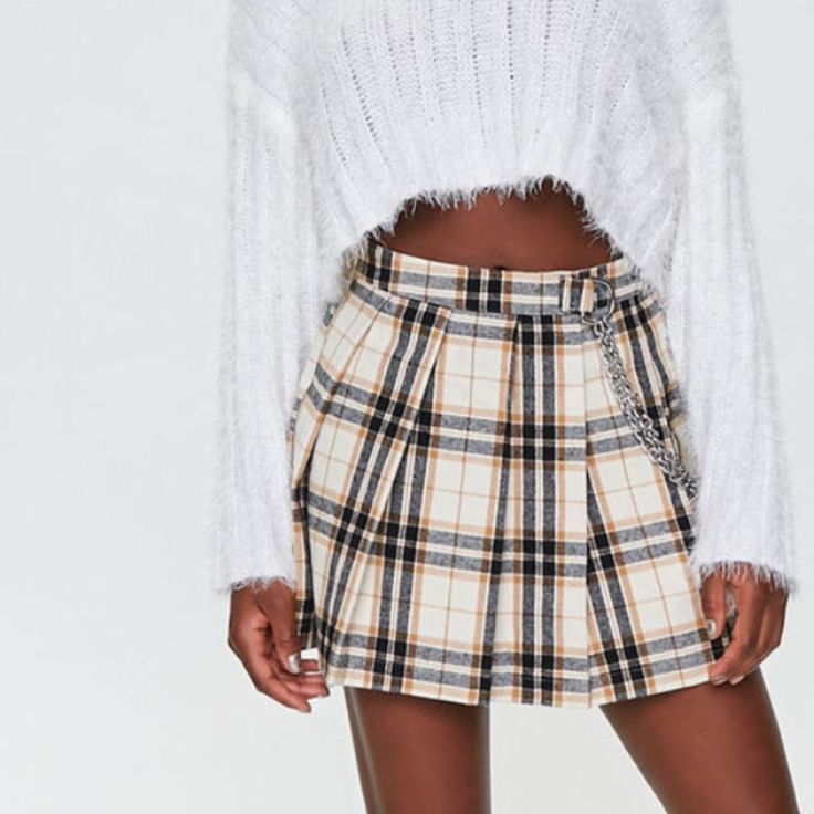 Women's Pleated Plaid Mini Skirt From Forever 21 In Cream/Multi. A Woven Mini Skirt Featuring An Allover Plaid Pattern, Pleated Construction, A-Line Silhouette, And Layered Wallet Chains. Content + Care - Shell: 100% Cotton - Lining: 100% Polyester - Hand Wash Cold New With Tag. Size: Available In Various Sizes Color: Cream/Multi Mini Skirt For Women Black Chiffon Skirt, Plaid Pleated Mini Skirt, White Lace Skirt, One Piece Clothing, Patterned Skirt, Checkered Skirt, Distressed Denim Skirt, Miniskirt Outfits, Influencers Fashion