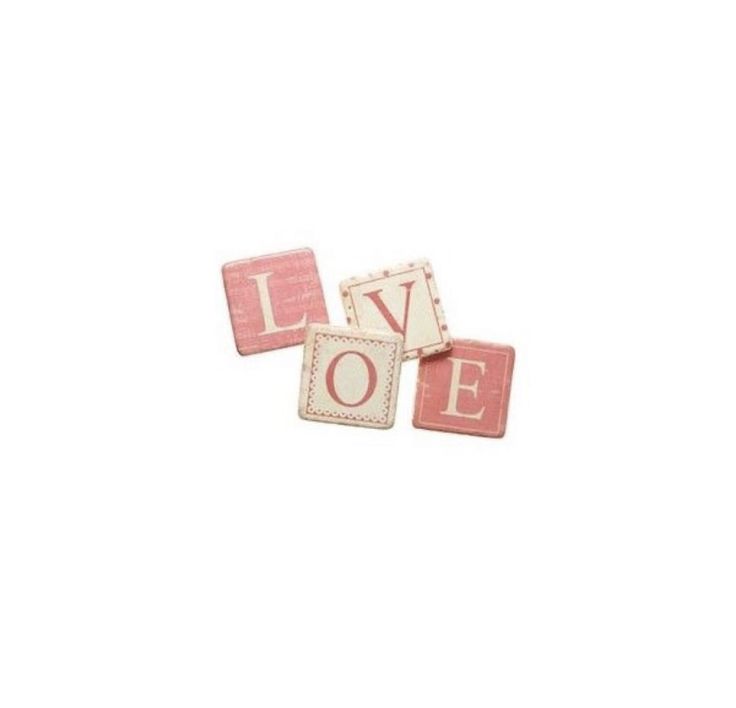 three pink and white tiles with the word love spelled in small letters on top of each other