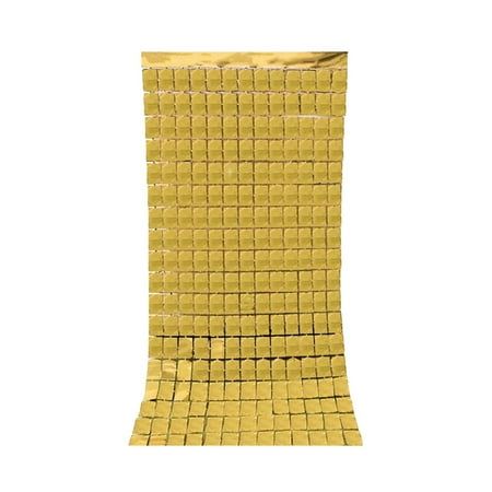 a piece of yellow cloth with squares on it and one side is folded in gold foil