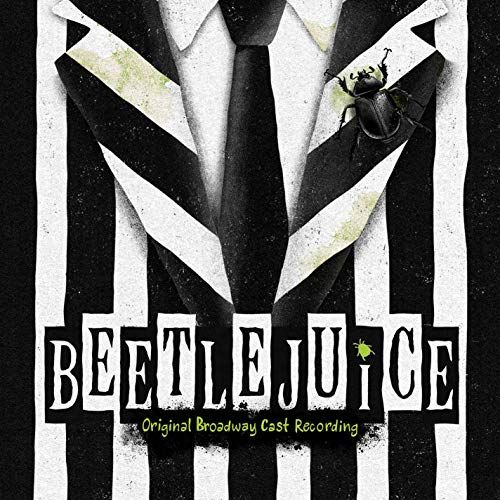 a poster for beetle juice featuring a man in a suit and tie with an insect on his lapel