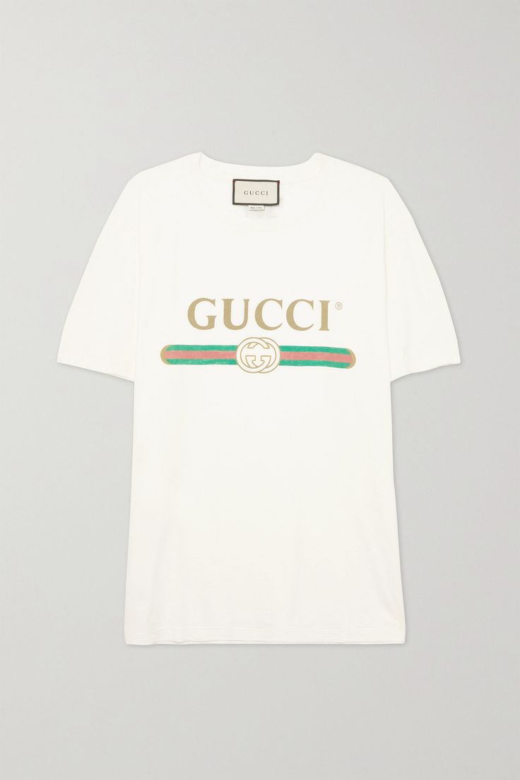 Gucci's T-shirt has been spotted on everyone from Margot Robbie to Olivia Culpo. Cut from lightweight cotton-jersey, this oversized version is detailed with faded gold lettering, the label's signature web motif and a playful floral appliqué at the back. It's distressed around the neckline for a vintage feel. Emme Parsons, Agolde Shorts, Dress Outfits Ideas, Gucci Shirt, Gucci T Shirt, Laura Lombardi, Gucci Outfits, Olivia Culpo, White Lotus