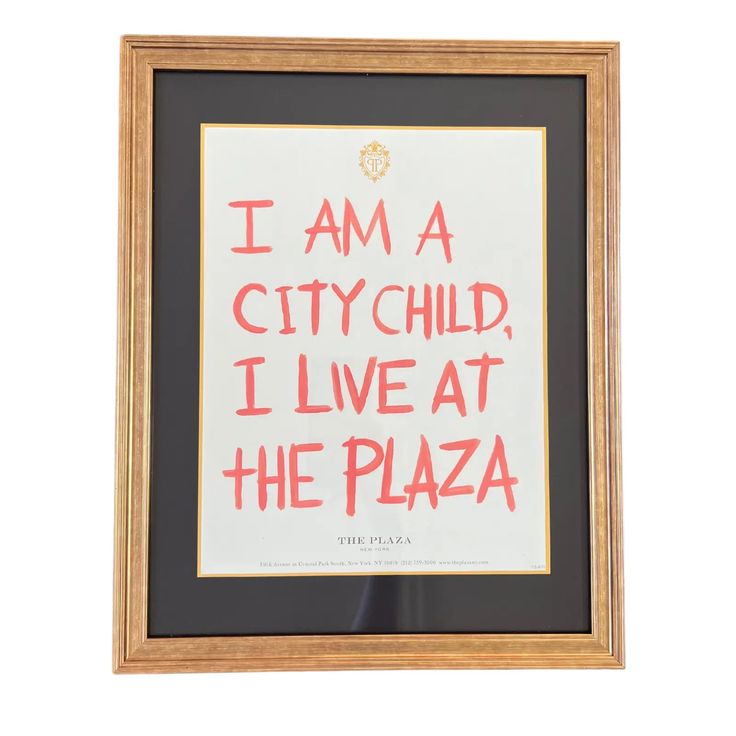 i am a city child, i live at the plaza framed art print in black and red