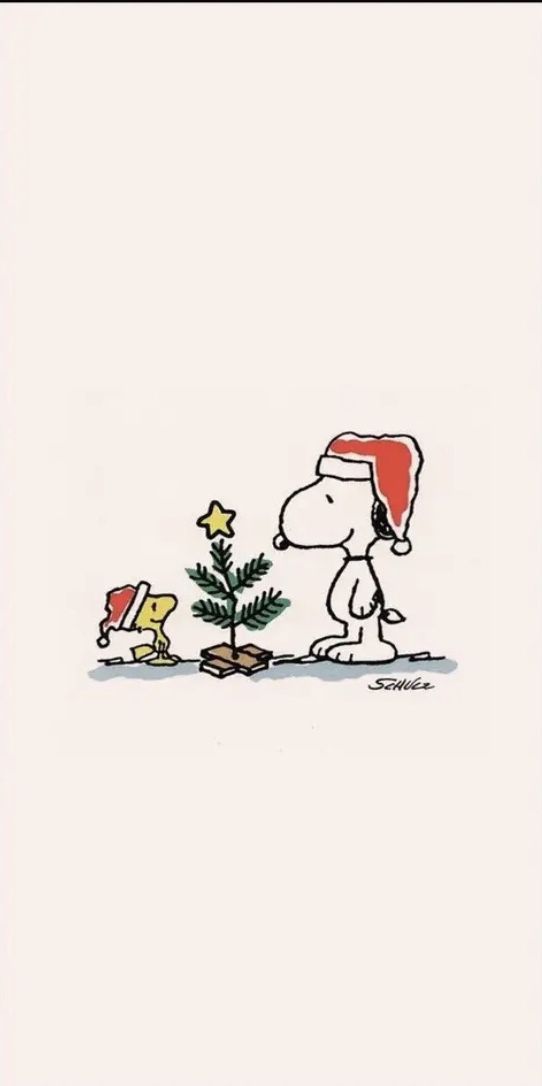 a charlie brown christmas card with a small tree