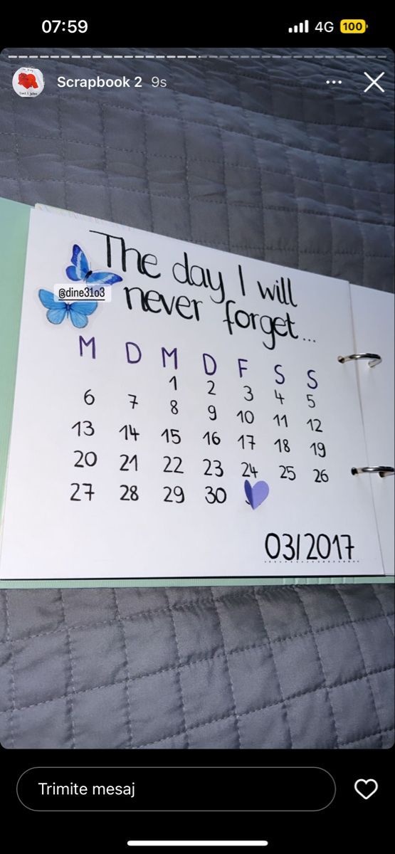 the day i will never forget calendar is posted on a bed sheet that has been pinned to it