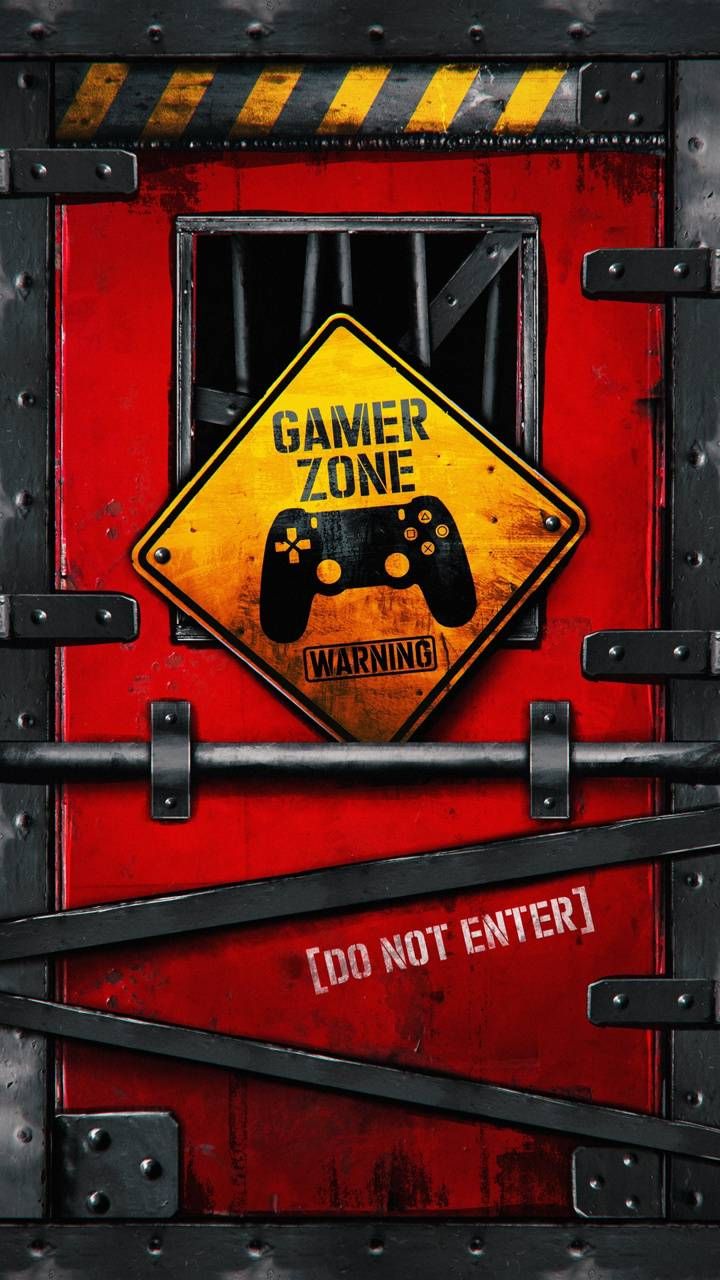 a sign that says gamer zone is on the side of a red box with metal bars