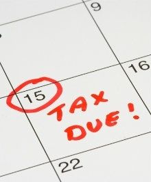 a calendar with the word tax due written on it