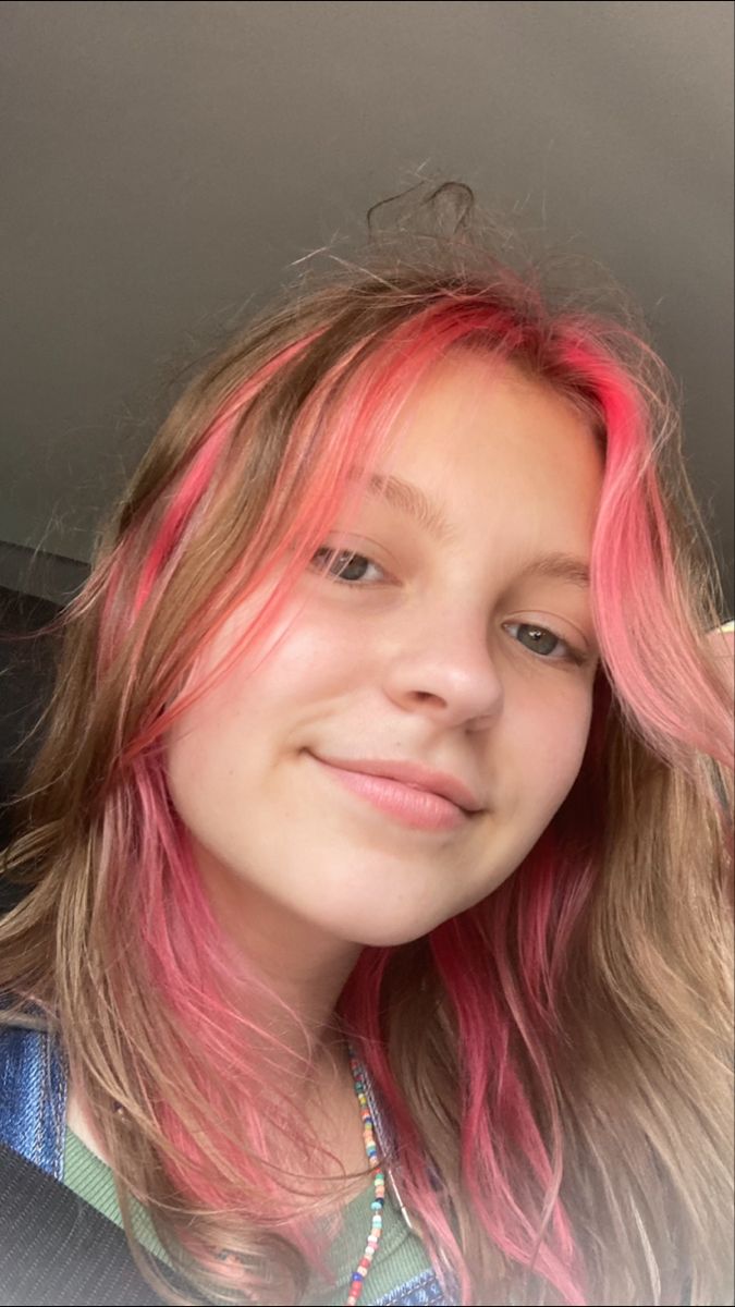 Pink Strands In Brown Hair, Pink Strips In Hair, Front Strand Of Hair Dyed, Pink Hair Underneath, Bright Pink Hair Color, Pink Underdye Hair, Pink Underneath Hair, Dirty Blonde Hair With Highlights, Red Hair Streaks