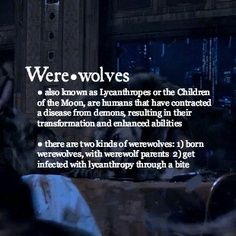 there are two people sitting at a table in front of a window with the words werewolvess on it