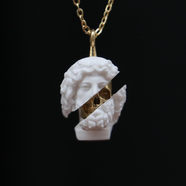 This striking Zeus Skull pendant is a handcrafted masterpiece made from marble. Featuring a split design with the head of Zeus and a brass skull, this unique necklace blends classical Greek mythology with modern skull art. Perfect for those who love bold, artistic jewelry pieces, this pendant makes a statement. A great gift for mythology enthusiasts, art lovers, or anyone looking for a standout piece of artisan jewelry. Wear a piece of history with a contemporary twist! This is made with 925 Silver - Brass And Marble material. Let's not forget that it is handmade. There may be minor differences. It can be made with other materials. You can send a message. If you have any questions, please feel free to contact me, we are happy to help. Your jewelry will be packed in a luxury jewelry box rea Greek Mythology Jewelry, God Pendant, Mythology Jewelry, Luxury Jewelry Box, Artisan Necklace, Art Necklaces, Greek God, Split Design, Art Pendant