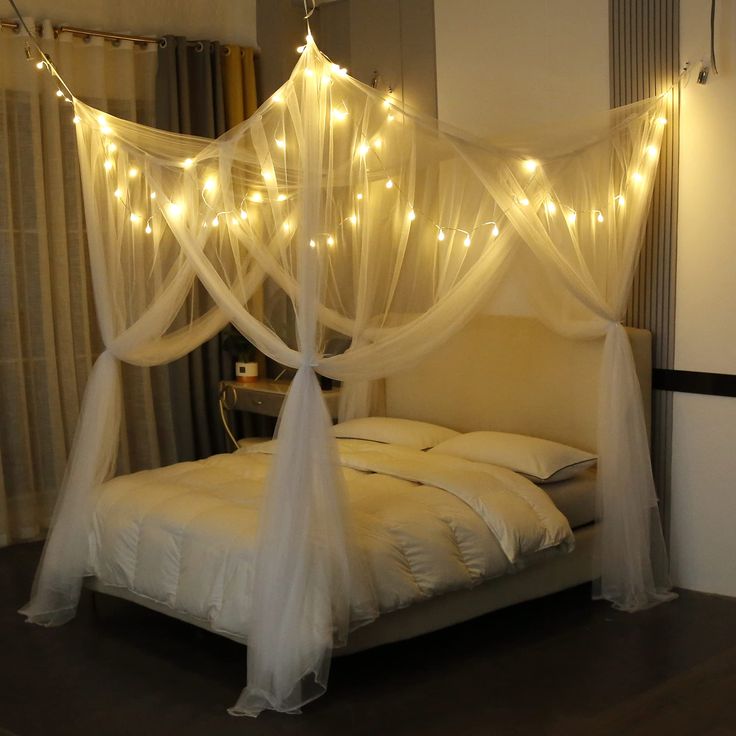 PRICES MAY VARY. Canopy size: L87xW80xH98" Inches, Suitable for Full, Queen and King size bed,Also suitable for outdoor. Package Include: bed canopy x1+Lights+ ribbon x4 + hanging hook x6 + anchors x6. Bed Canopy for Bedroom Decor: Hanging the black canopy bed curtains makes your own bed an artwork, create an atmosphere of elegance and romance for you,and also perfect decor for more occations which like Birthday Party, Wedding, Halloween , Christmas...DIY it into various shapes that you are satisfied with to suit for your exclusive party. Super Easy Installation with 2 ways to set up: Four corners with rope，Easy to distinguish direction，You can use hooks install the canopy easily into the ceiling OR hang it from the corners of your four-post bed for an added touch of style and elegance. 10 Canopy With Lights, White Bed Canopy, Bed Canopy With Lights, Black Canopy Bed, Farmhouse Style Bedroom Decor, Bed Drapes, Post Bed, Canopy Bed Curtains, Canopy Curtains