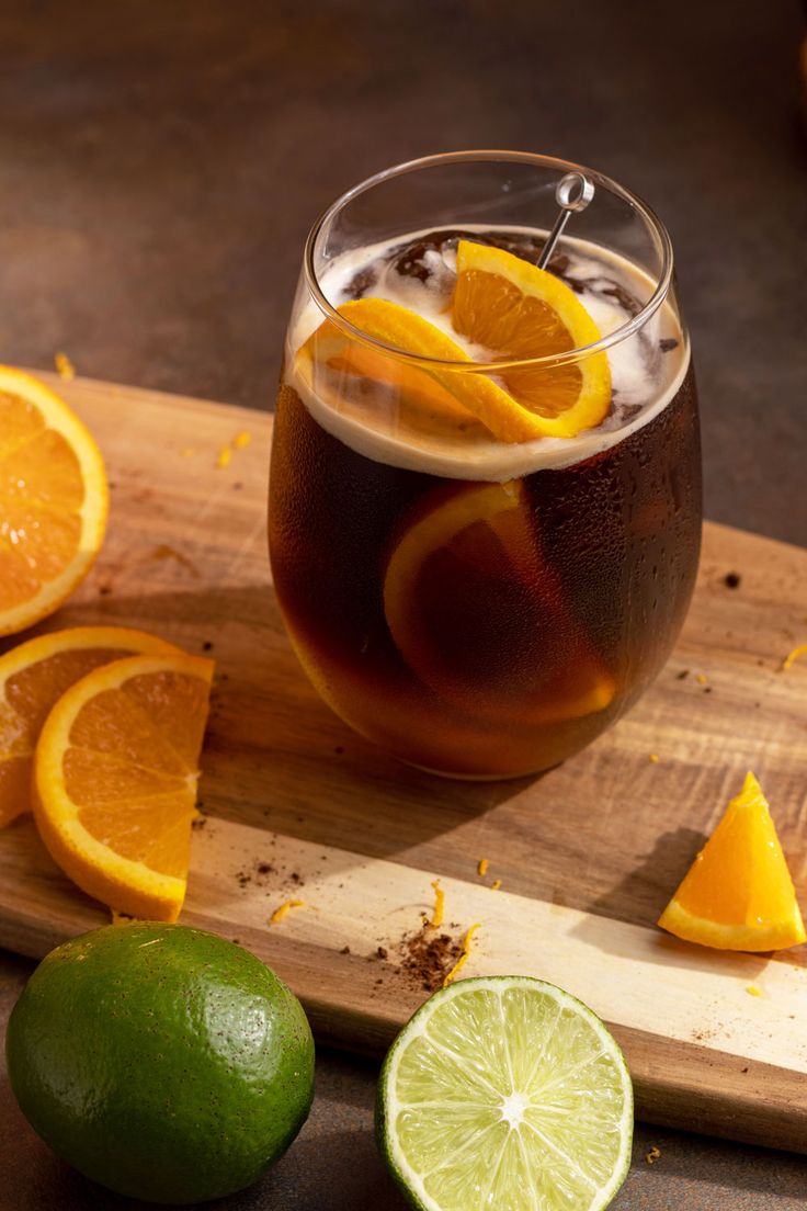 Espresso tonic with orange slices on a wooden board. Espresso Tonic Recipe, Espresso Tonic, Valentine 2024, Brown Sugar Simple Syrup, Homemade Syrups, Iced Lattes, Tonic Recipe, Orange Wheels, Homemade Syrup