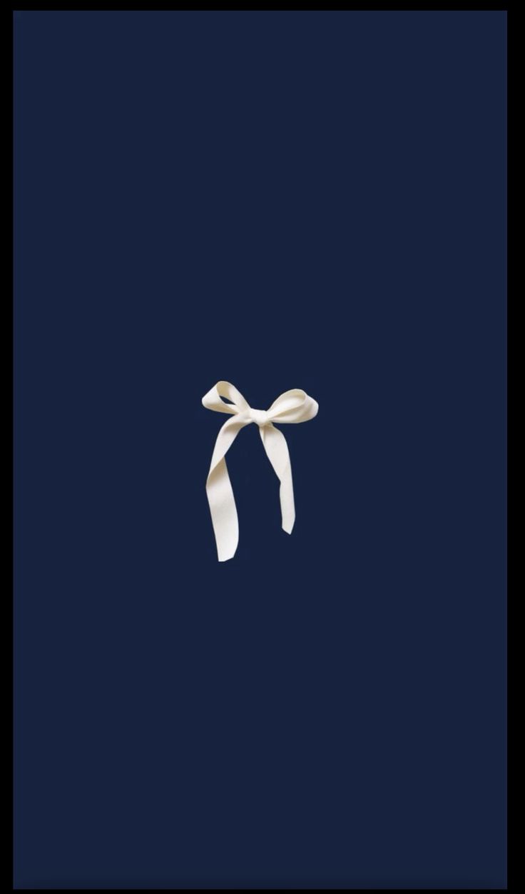 a white ribbon on a dark blue background