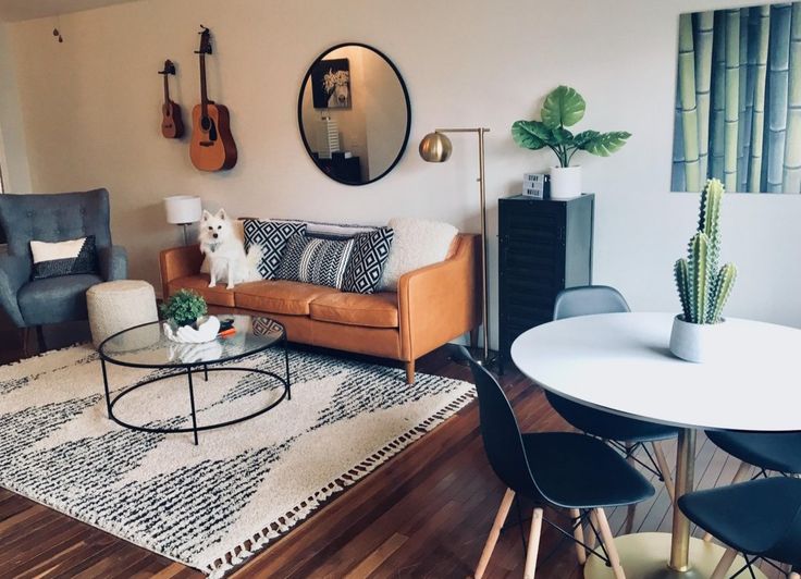 a living room filled with furniture and decor