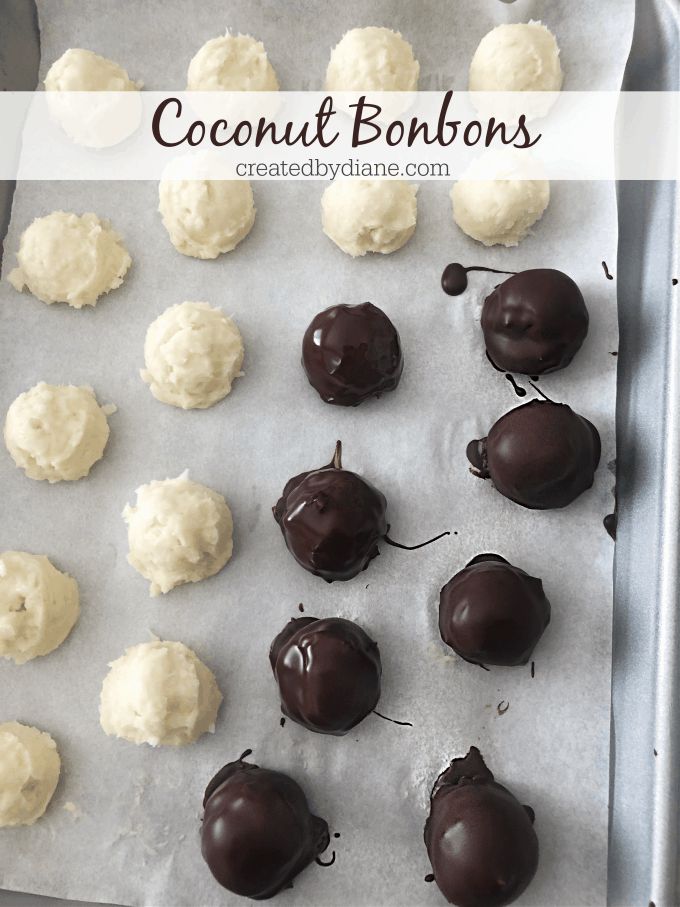 chocolate covered coconut bonns are on a baking sheet and ready to go into the oven