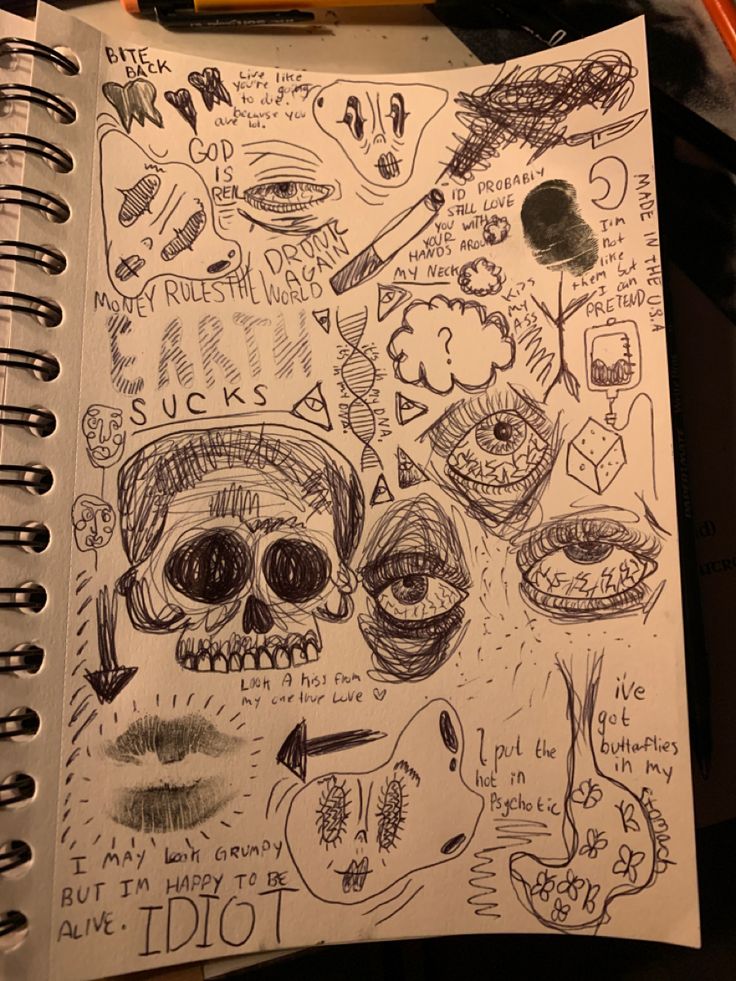 a notebook with some drawings on it