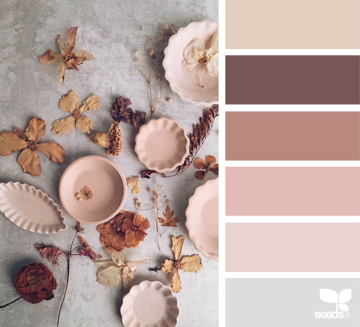 the color palette is pale, brown and pink with some leaves on top of it