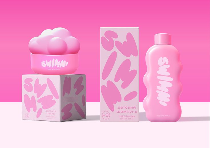 a pink bottle next to a white box on a pink and white background with the word swm written in cursive font