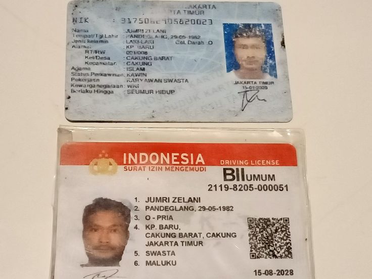 two id cards with an image of a man's face and name on them