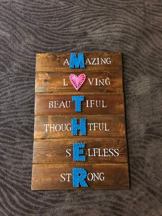 a wooden sign that says amazing loving beautiful thought and selfless strong heart on it